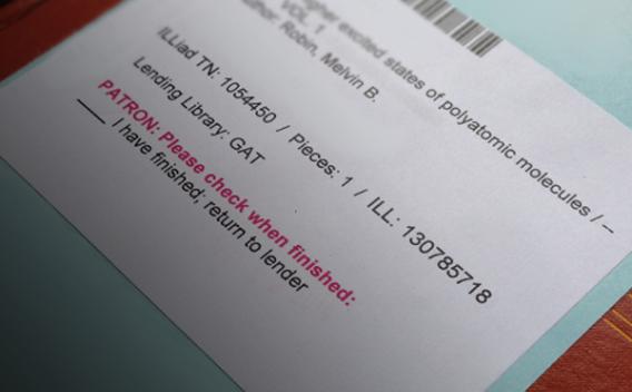 Interlibrary Loan book insert card showing barcode and lending library information