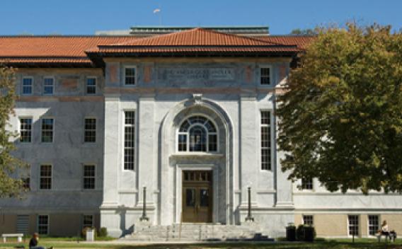 Exterior of the Candler Library building, facing the tree-lined quad